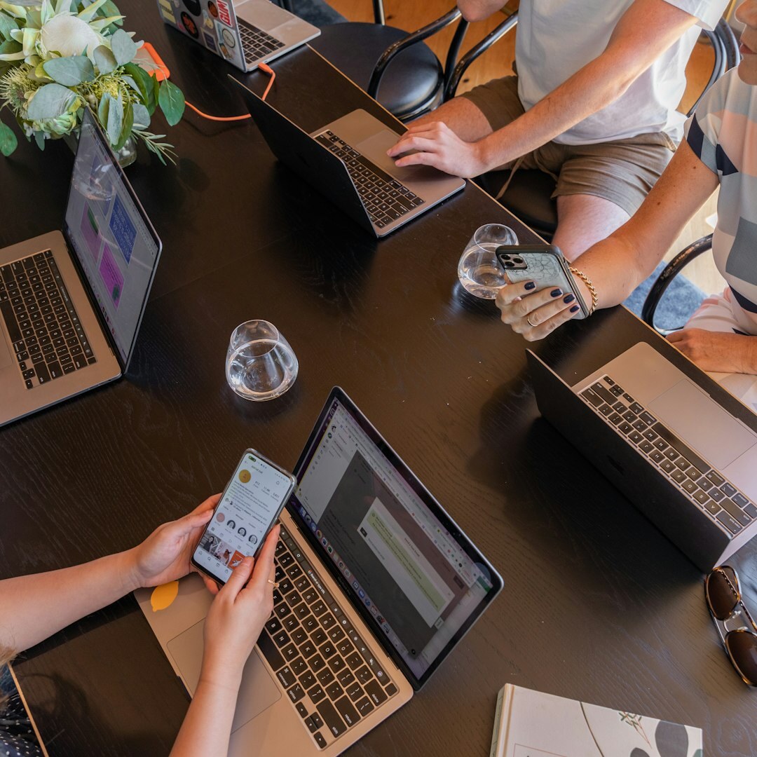 Small group of people having a deep conversation around a table