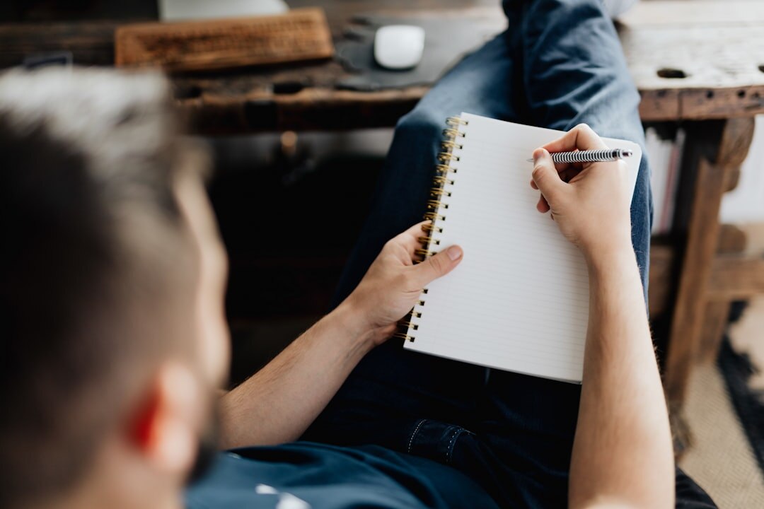person writing goals